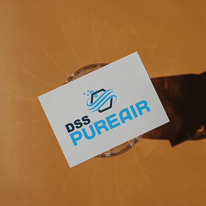 DSS Pure Air logo displayed on a business card