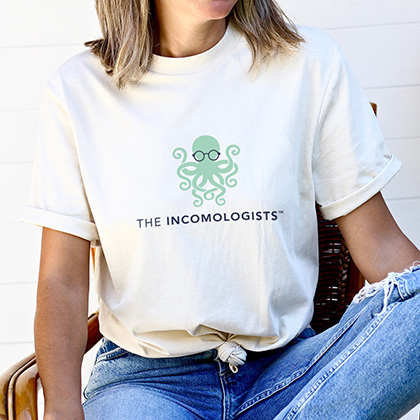 The Incomologists logo displayed on a t shirt